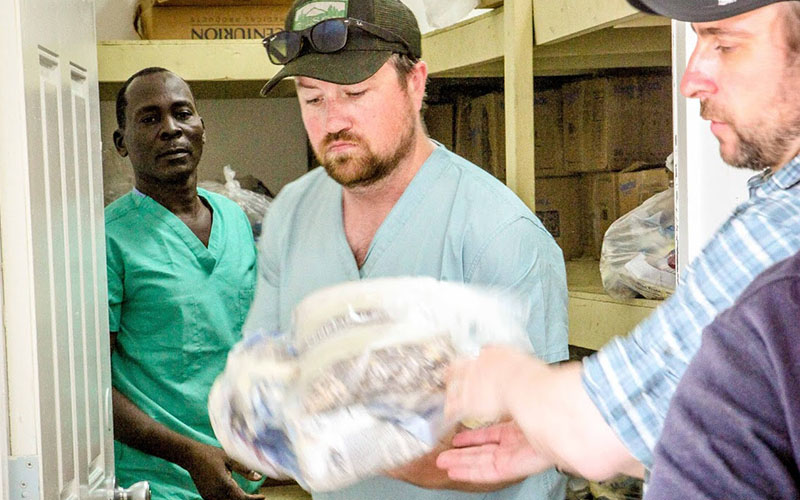 Ryan unloading supplies in Haiti.